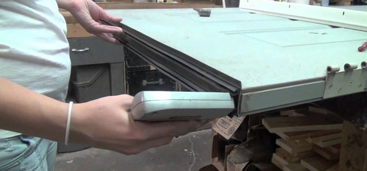 damaged steel door repair Boynton Beach